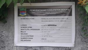 Kegiatan  Jalan  Lingkungan  kp   Curuq  Rt 01 /03  Desa  Cibarusah  Kota  Menjadi  Tanda  Tanya  Bagi   LSM  KOMPARASI .